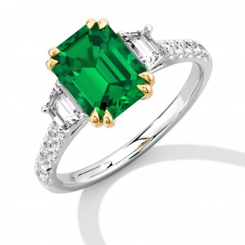 Platinum Emerald and Trapeze cut Diamond Trilogy ring Platinum Emerald and Trapeze cut Diamond Trilogy ring