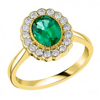 18ct Gold Emerald and Diamond Oval Vintage Cluster ring 18ct Gold Emerald and Diamond Oval Vintage Cluster ring